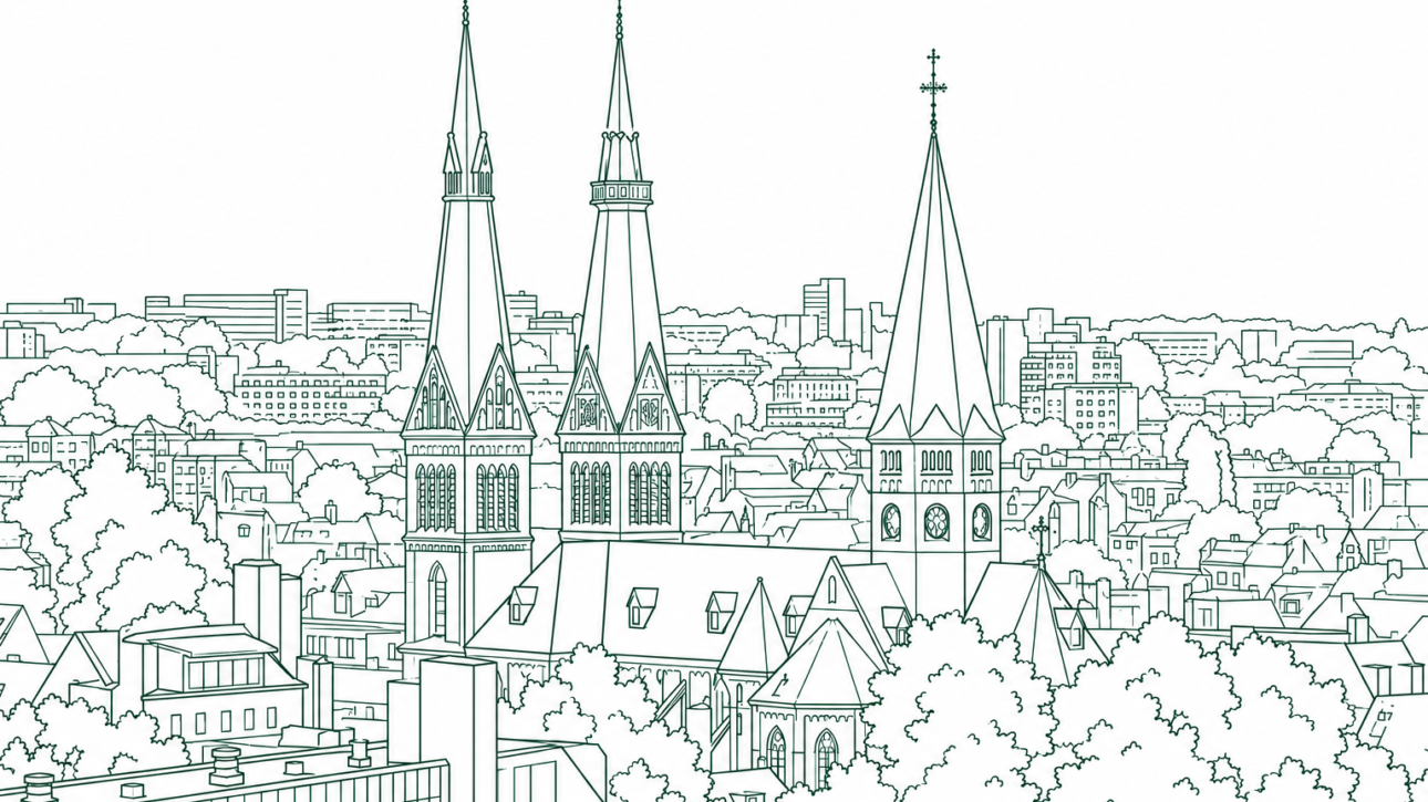 City skyline with three tall church spires and Gothic windows, surrounded by trees and low-rise buildings.