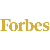 Forbes logo in gold lettering on a white background, brand wordmark.